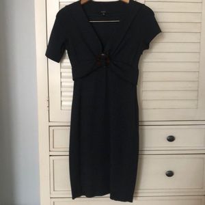 Gucci Navy dress with tortoiseshell accent.